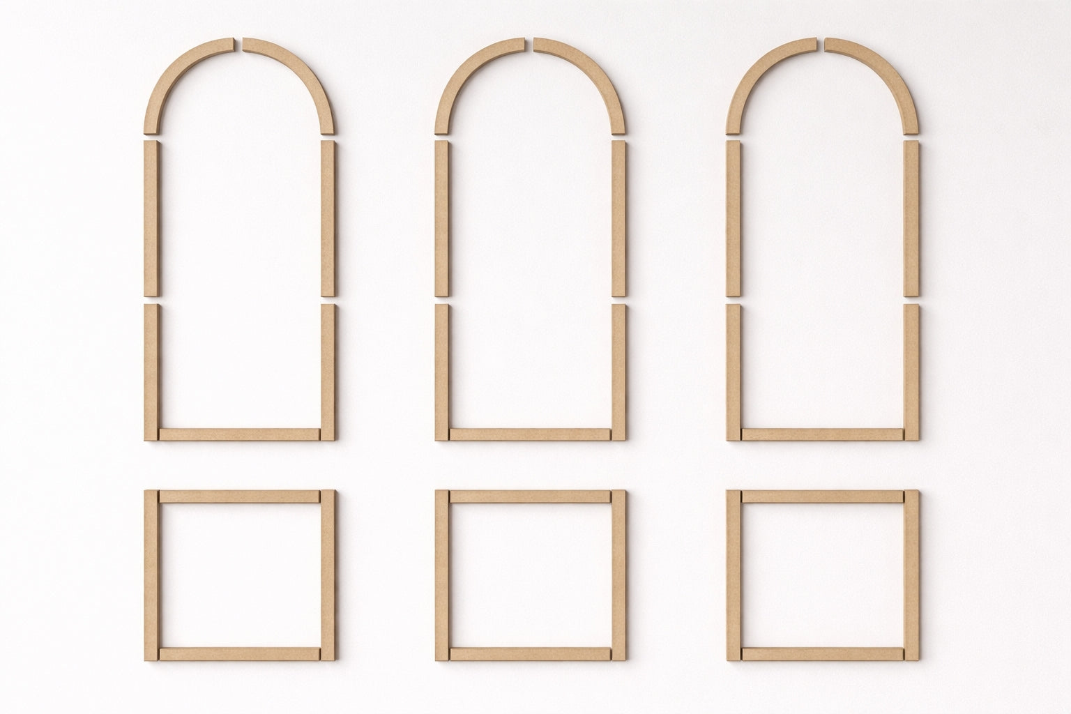 Set of MDF wooden picture frames with different shapes on a white background