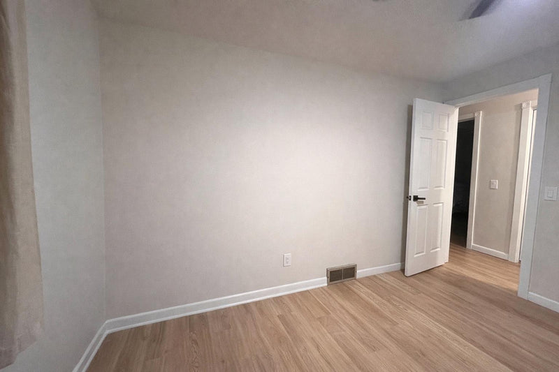 DIY picture frame wall molding panel design completed in modern living room
