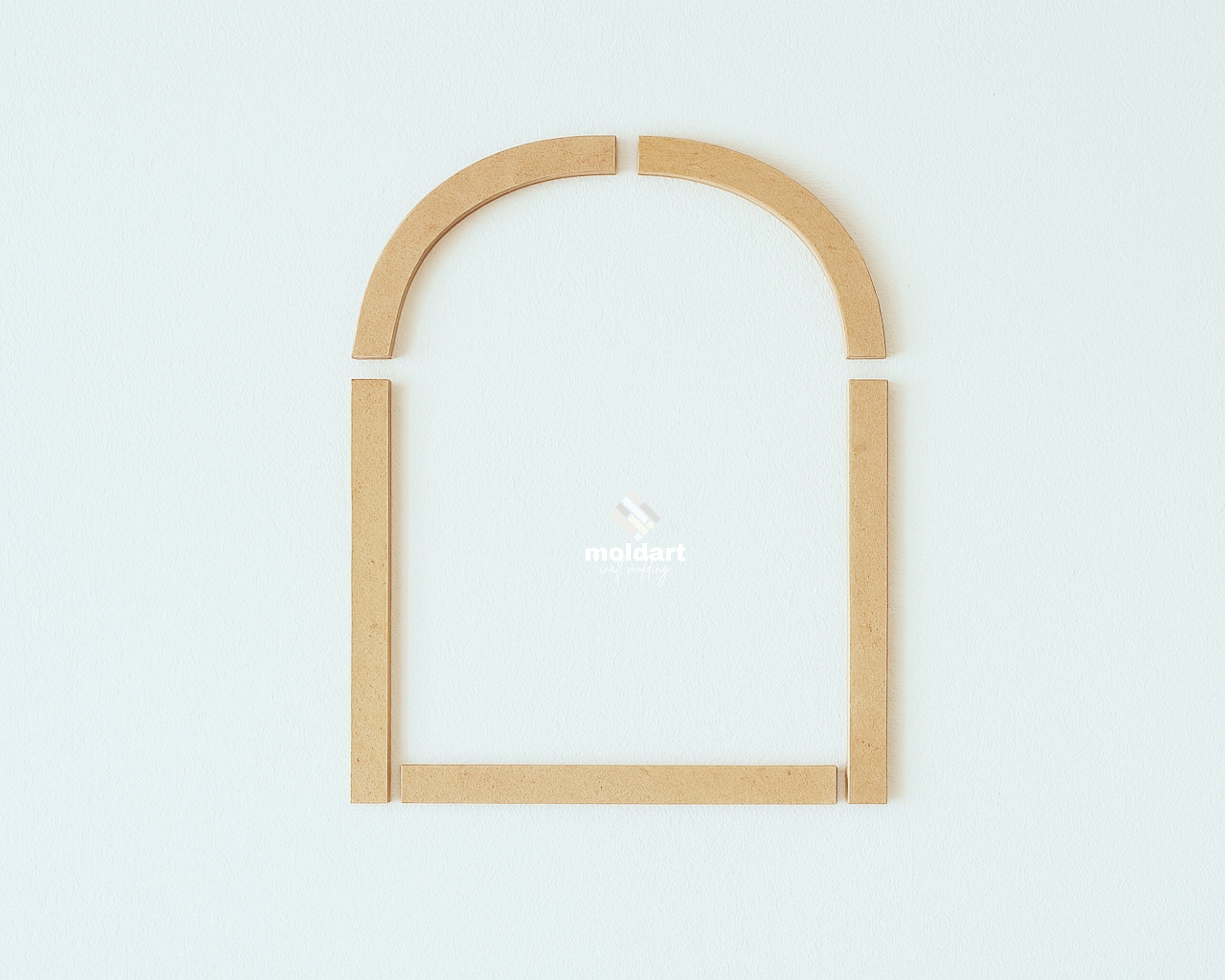 pre cut MDF wall molding pieces arranged on wall to show installation layout and arch panel design