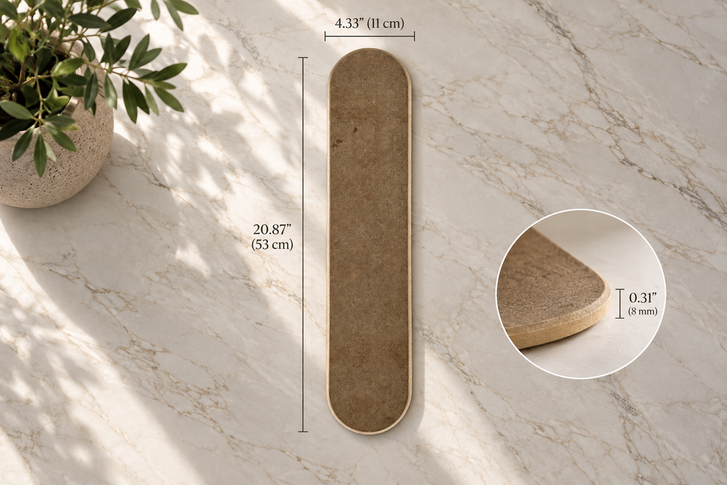 A rectangular tan textured mat with rounded ends and a thin light border, shown on a marble surface with dimension lines indicating 20.87" by 4.33".